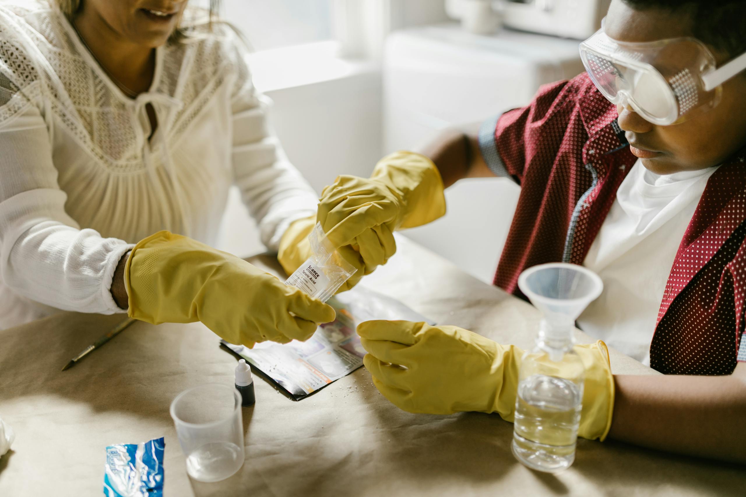 Kids engaged in science experiment they received as part of a non candy advent calendar gift