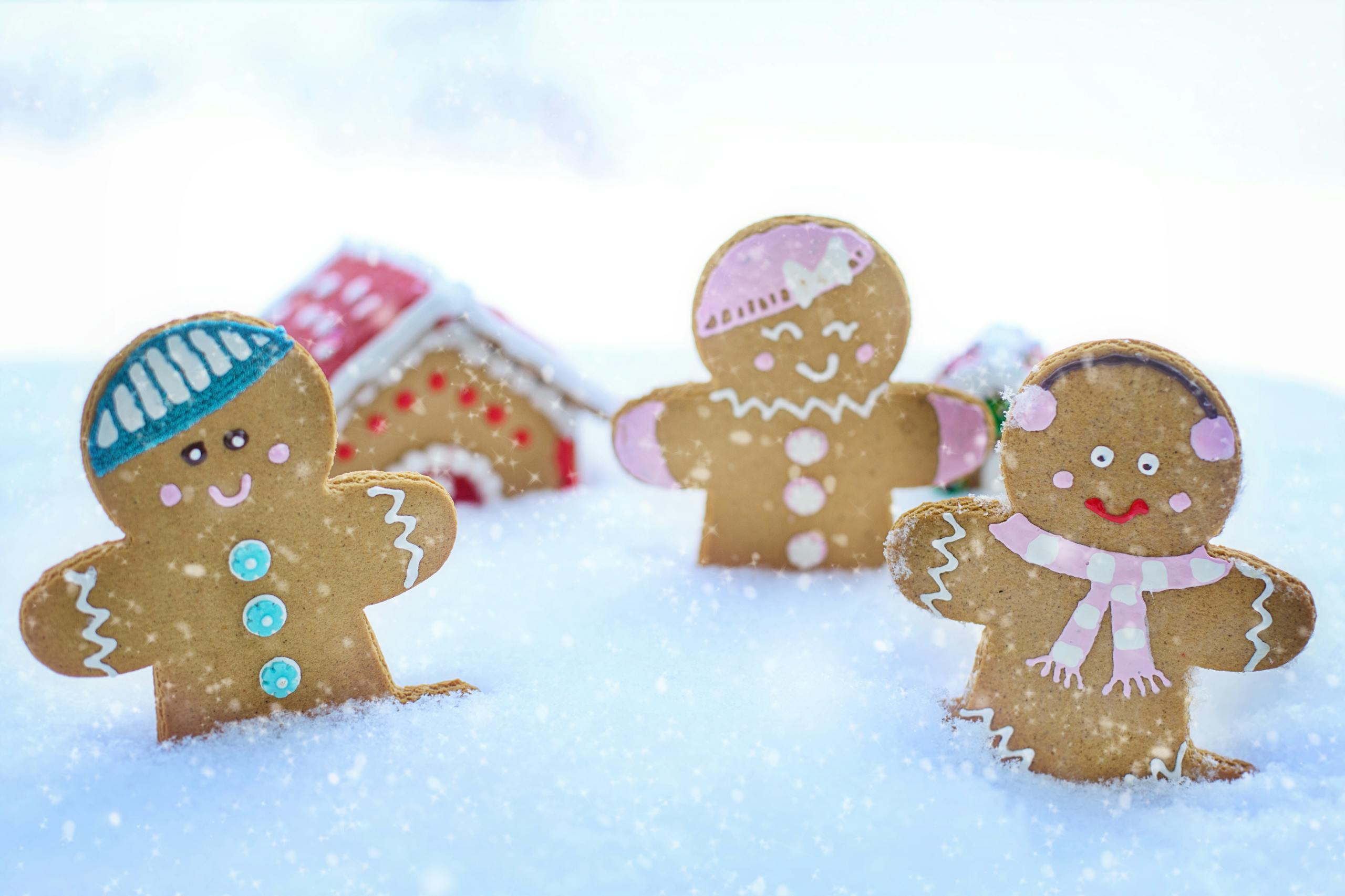 gingerbread cookie kids in snowy christmas scene
