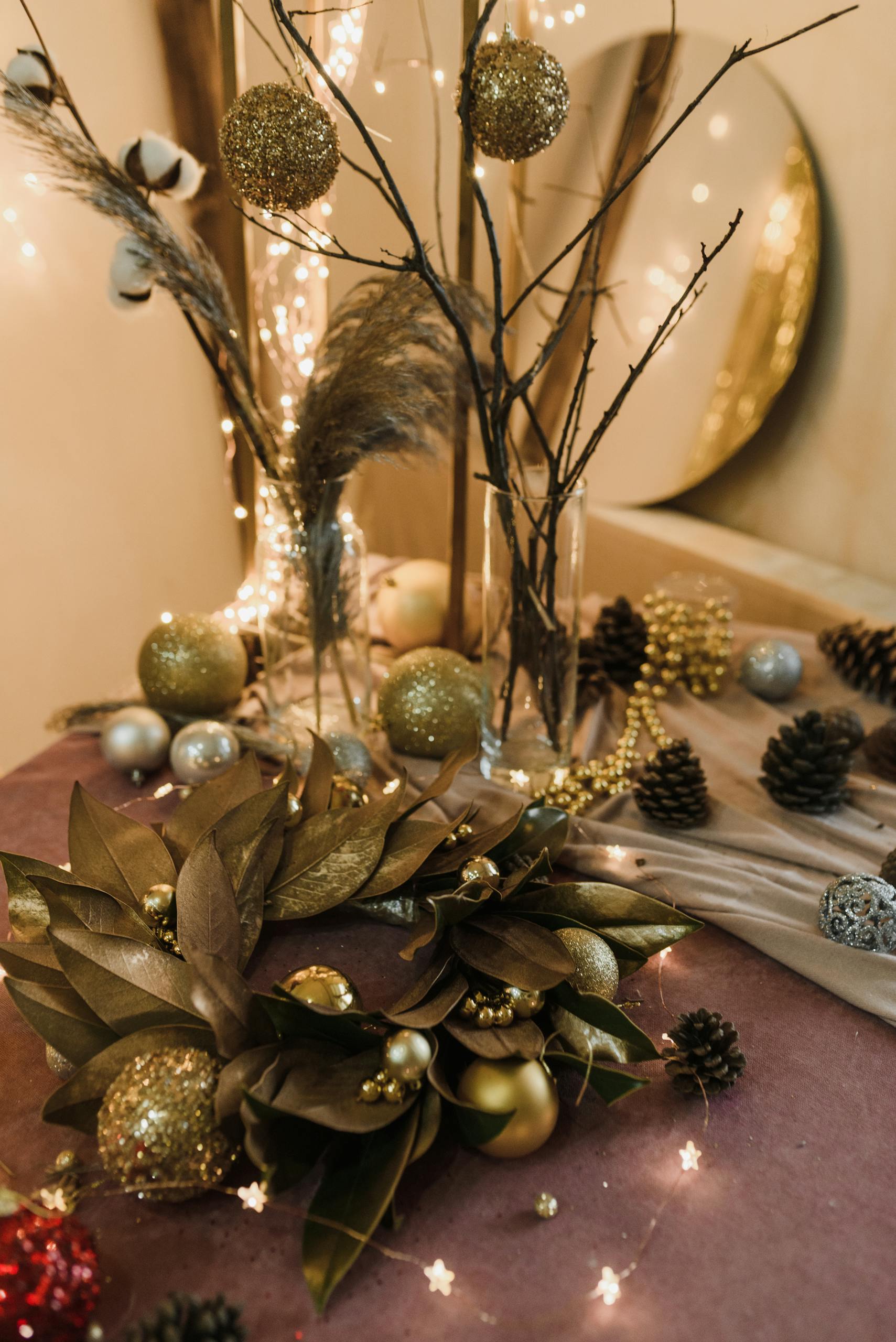 Festive holiday decorations featuring a wreath and golden ornaments creating a warm Christmas atmosphere.
