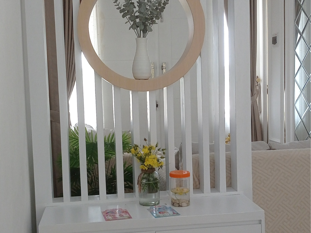 white ornate dressing table with slatted back acting as a room divider