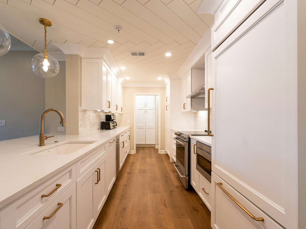 bright decluttered kitchen with simple summer styling — how to make your home feel like a holiday every day