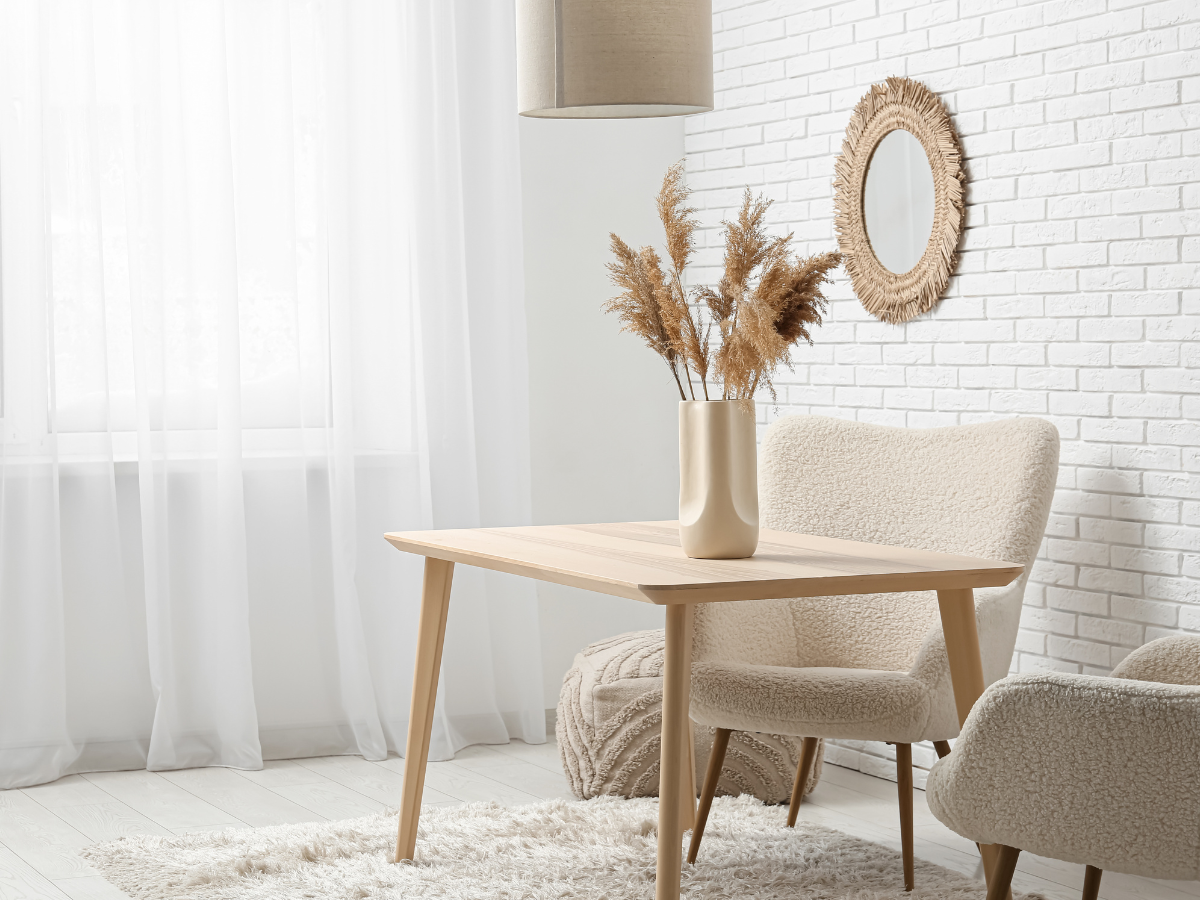 pampas grass and dried flowers in a tall vase — how to make your home feel like a holiday