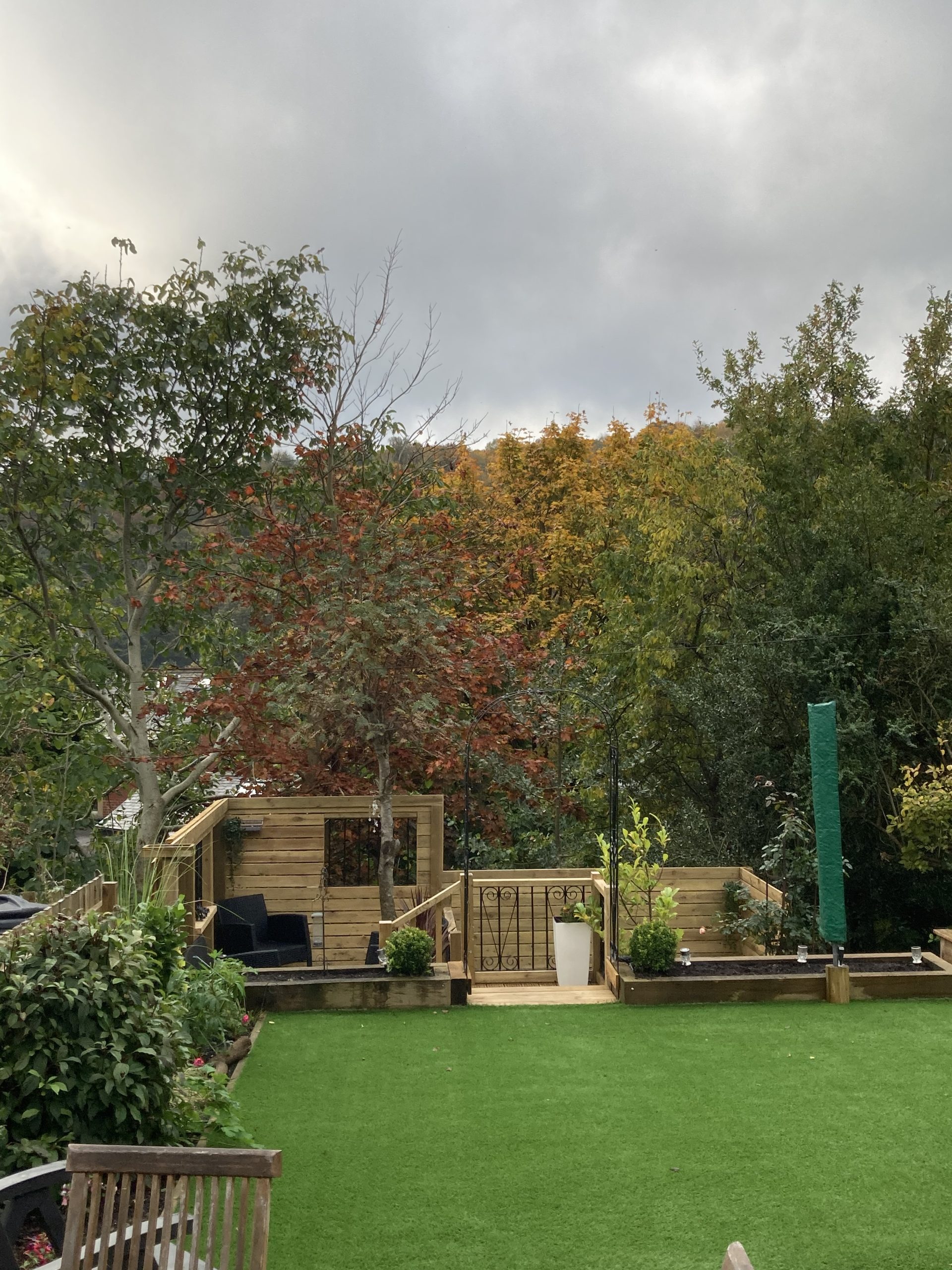 Beautiful Garden with fake grass and patio