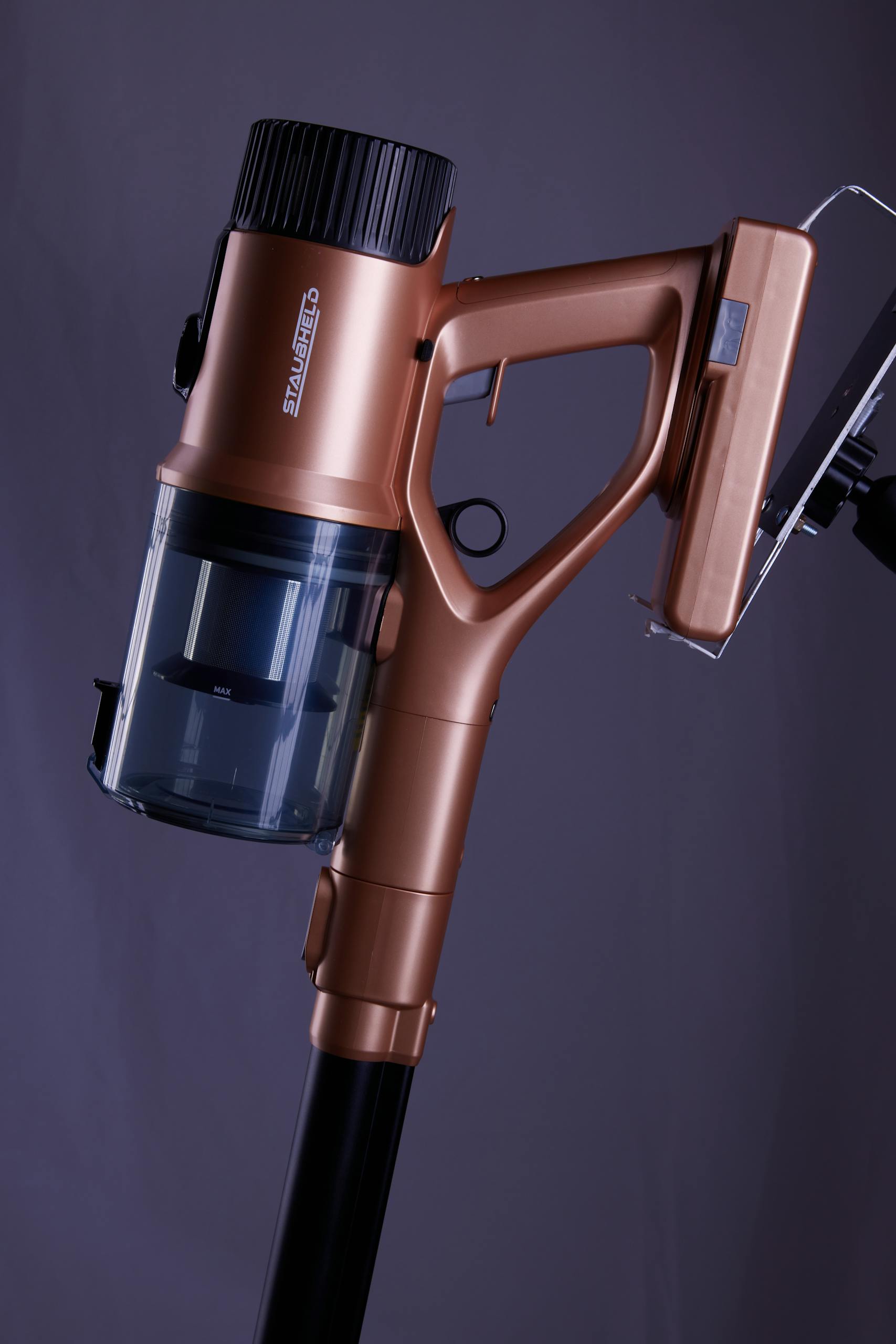 Close-up shot of a modern cordless vacuum cleaner in elegant design.