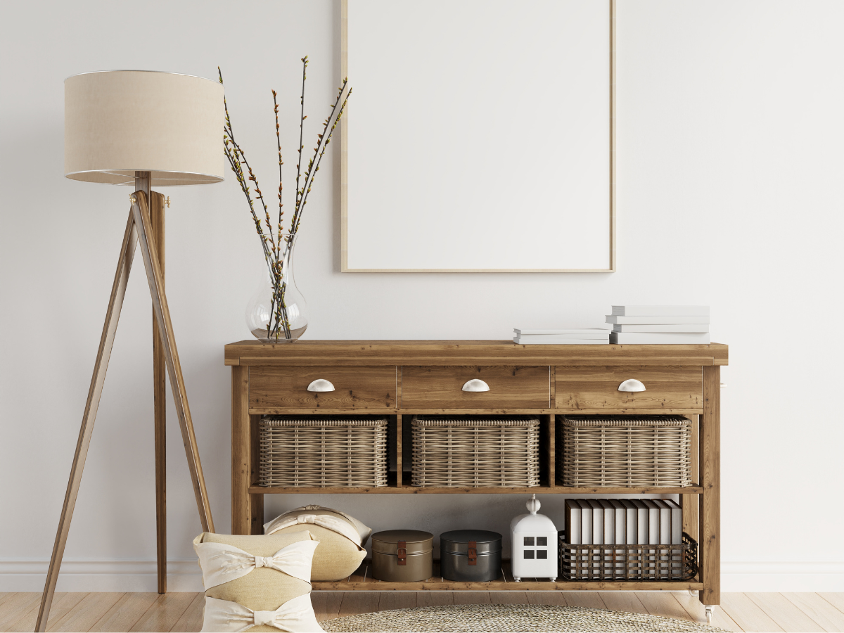 calm minimal living room with organised shelving — decluttering tips to make your home feel like a sanctuary