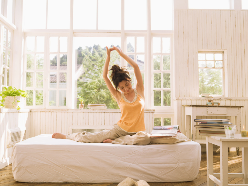Woman waking up on summer morning