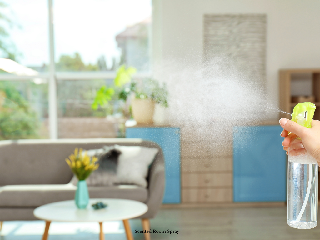 Spraying a room with scented room spray