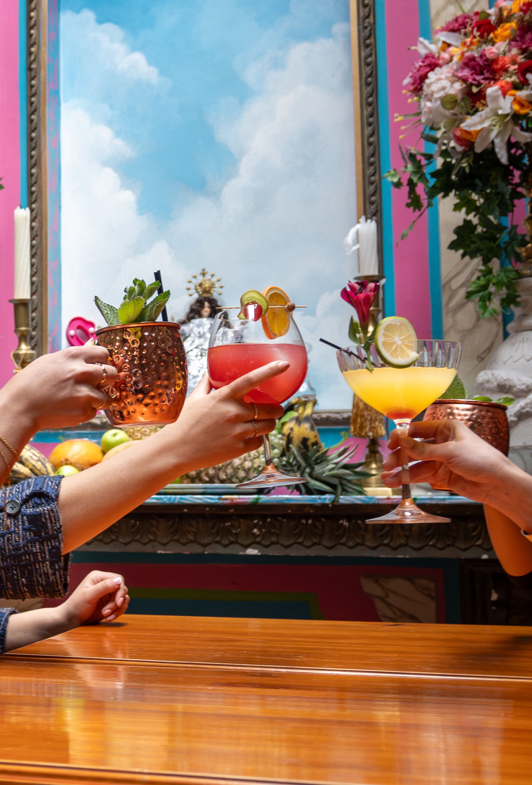 Vibrant cocktail toast for a DIY Cocktail Bar at Home for Summer Entertaining