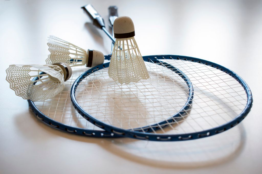 Vibrant image of badminton rackets and shuttlecocks, perfect for sports themed games at home