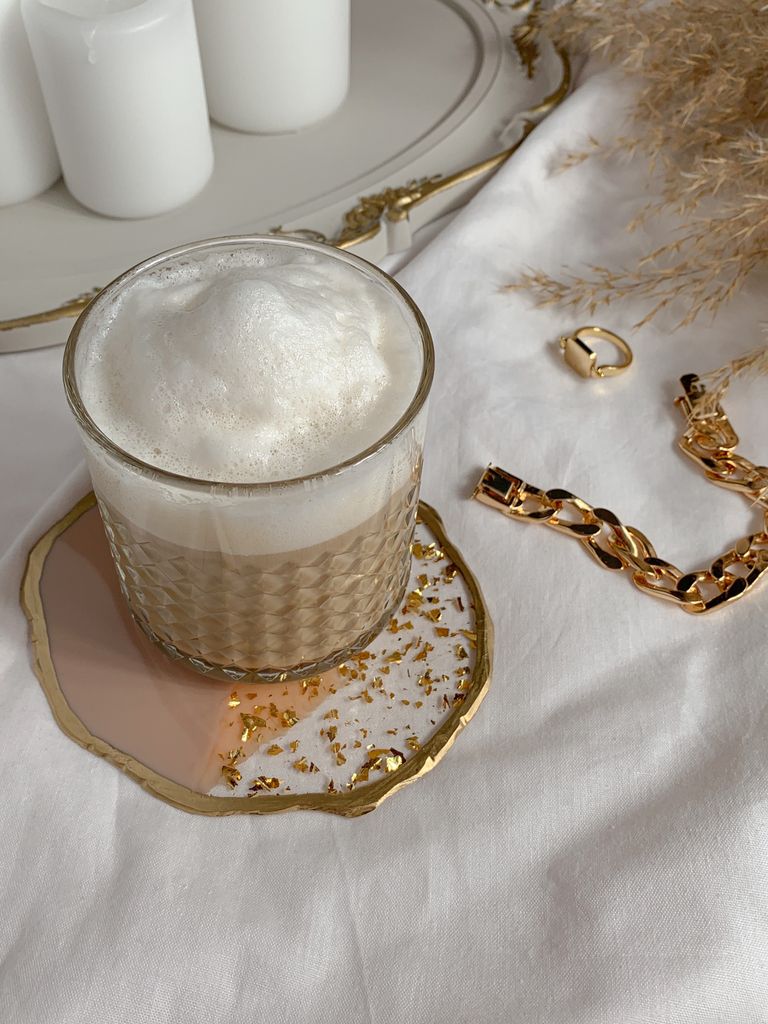 Marble Effect Coaster Holding Foamy coffee in glass cup